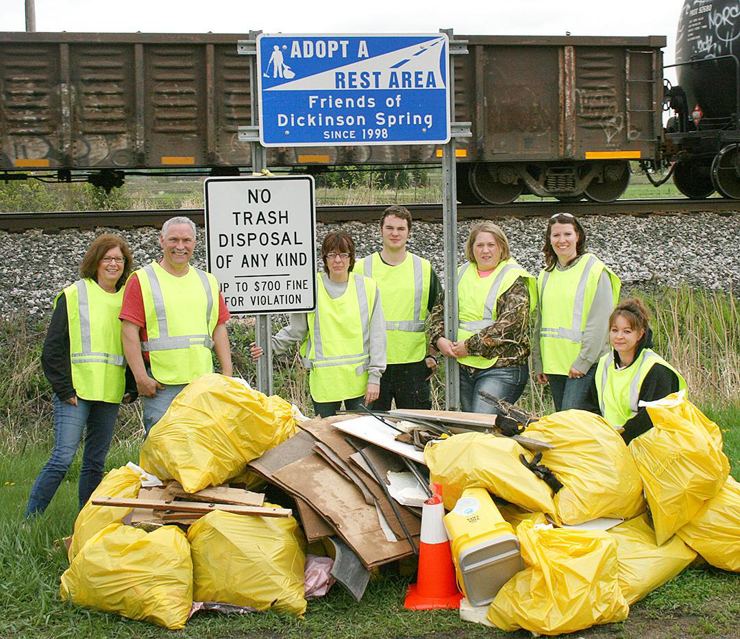 Memebers of Wright-Hennepin Electric clean up the highways