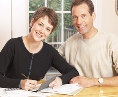 Couple paying their monthly bills