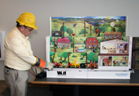 Wright-Hennepin employee giving electric safety demonstration