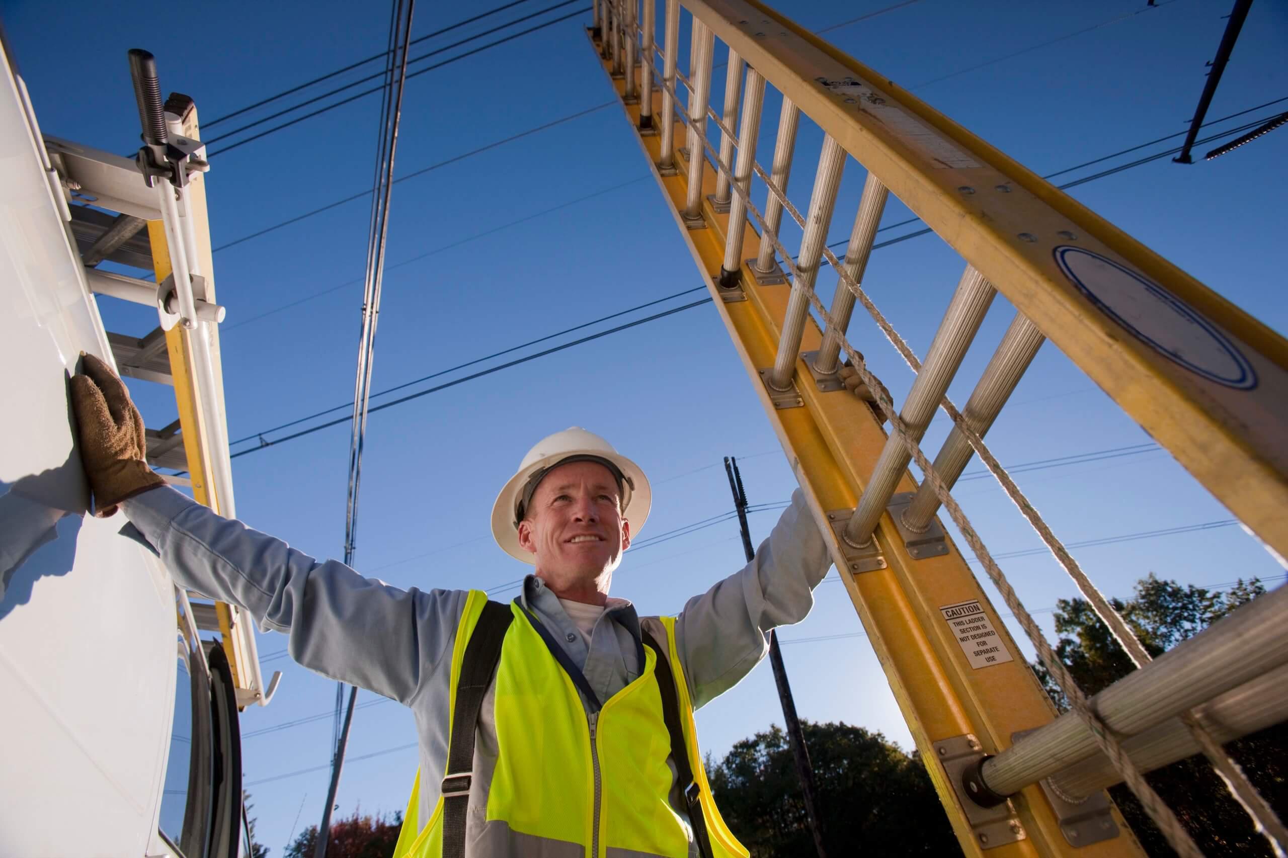 Person doing electric work safely