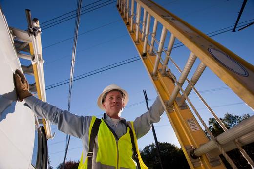 Person doing electric work safely