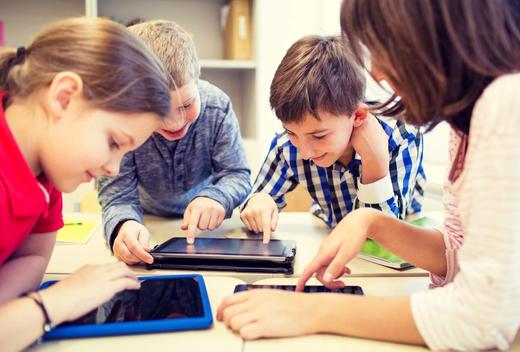 Students play with tablets