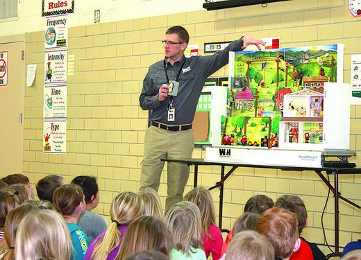 Wright-Hennepin provides a live demonstration for children