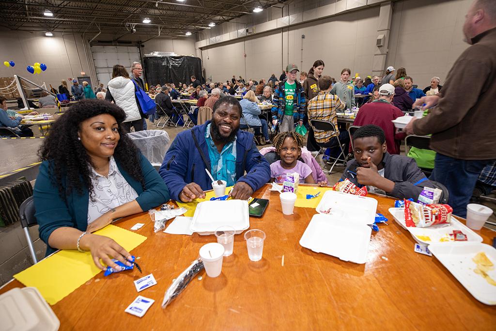 family at table smiling