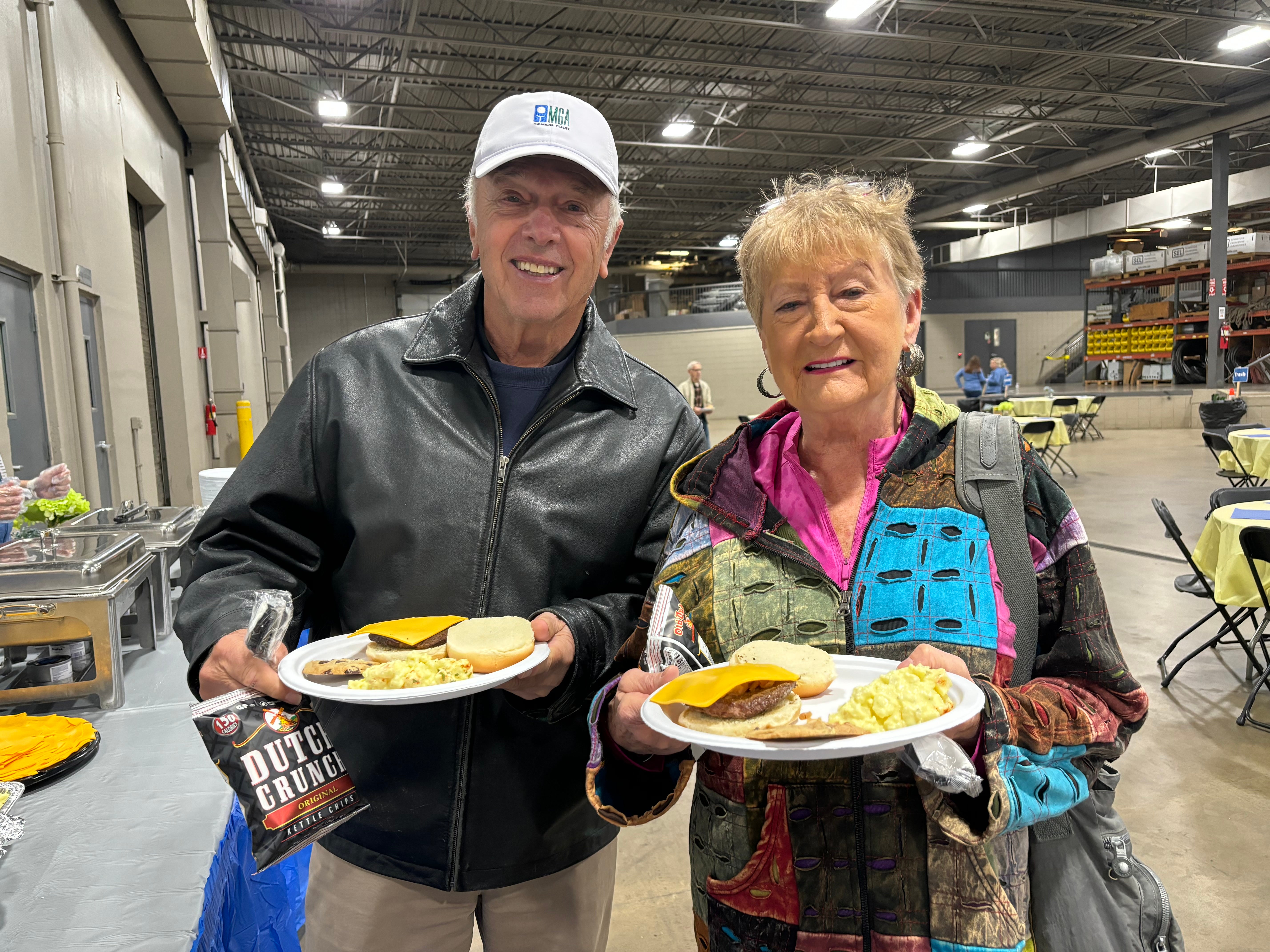 A couple with their food a the WH member lunch. 