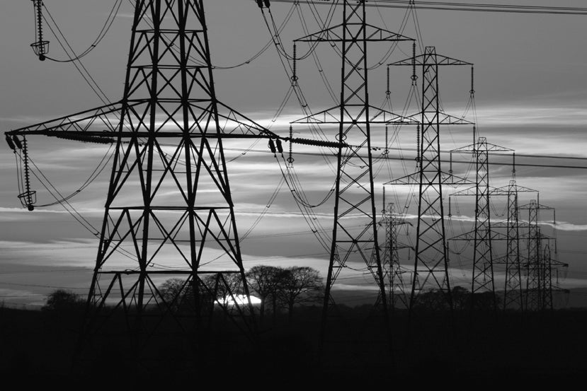 black and white photo of transmission lines
