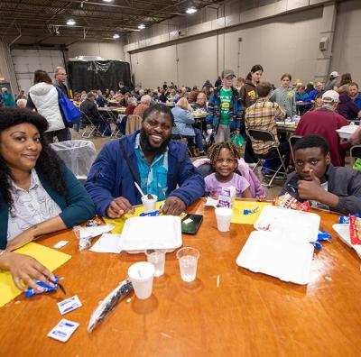 family at table smiling