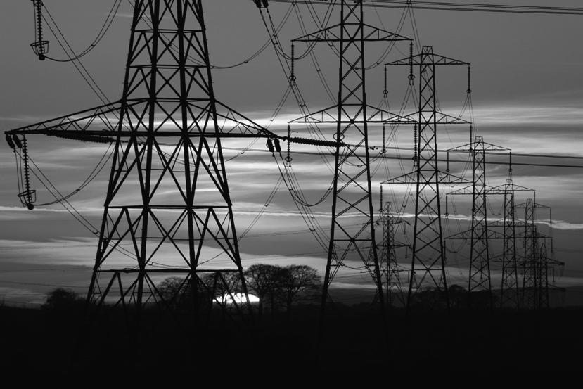 black and white photo of transmission lines